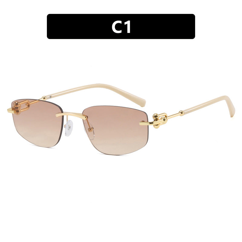 Ladies elegant semi-rimless glasses with luxurious metal frame and transparent lenses Stornfield