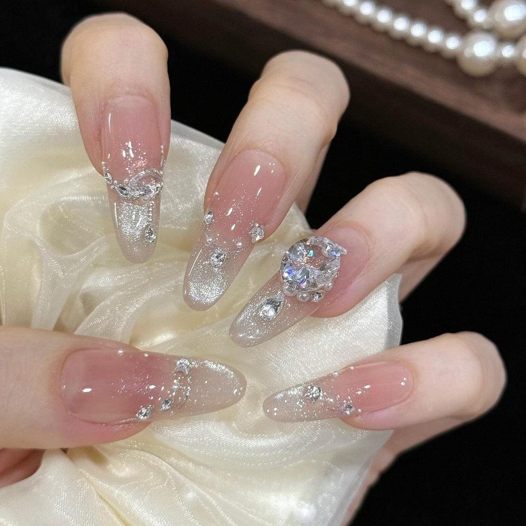 Artificial artificial nails with luxurious glitter and rhinestone design Stornfield