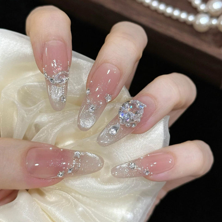 Artificial artificial nails with luxurious glitter and rhinestone design Stornfield
