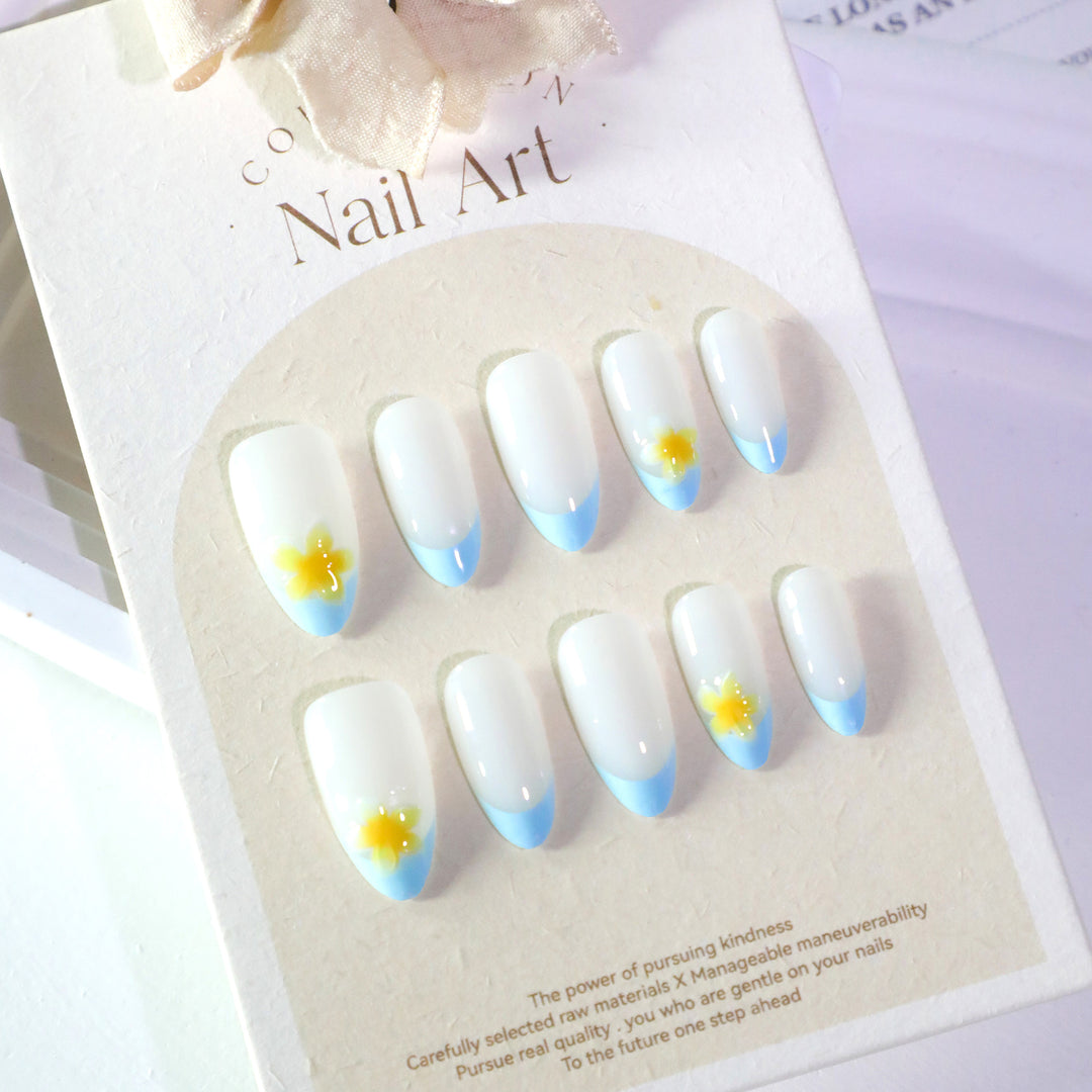 Artfully designed nail extensions with floral accent Stornfield