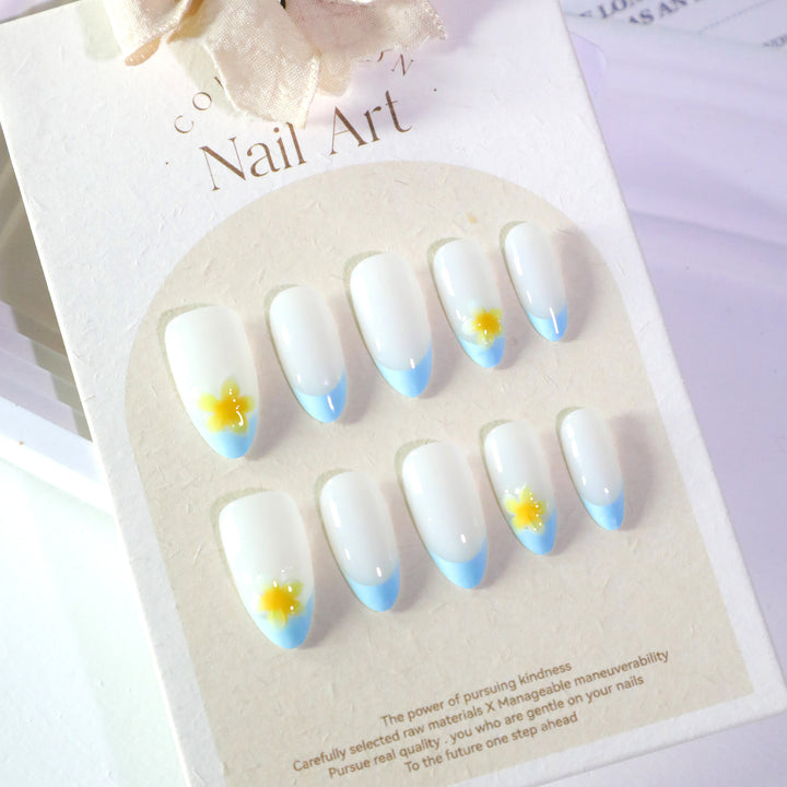Artfully designed nail extensions with floral accent Stornfield