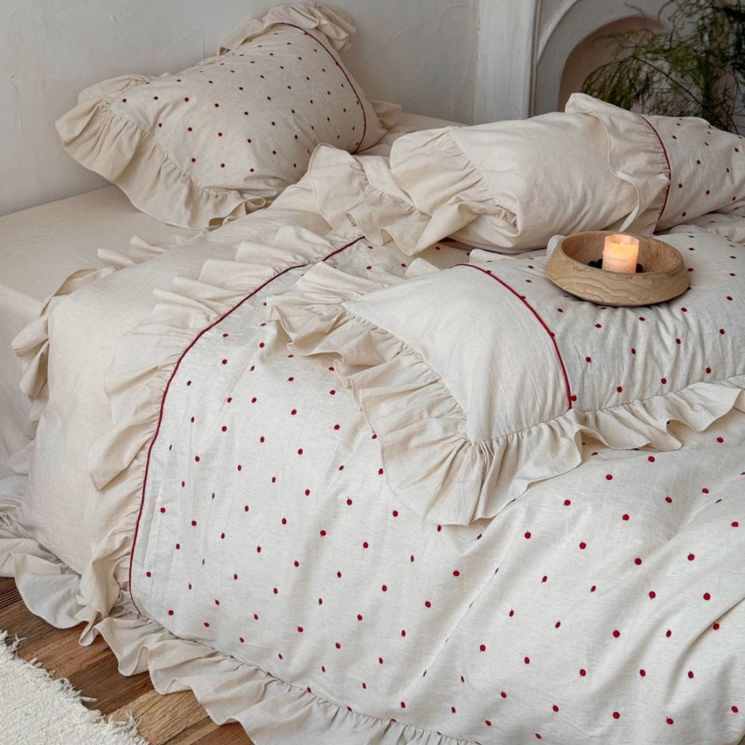 Romantic bedding set with ruffles and delicate dot embroidery