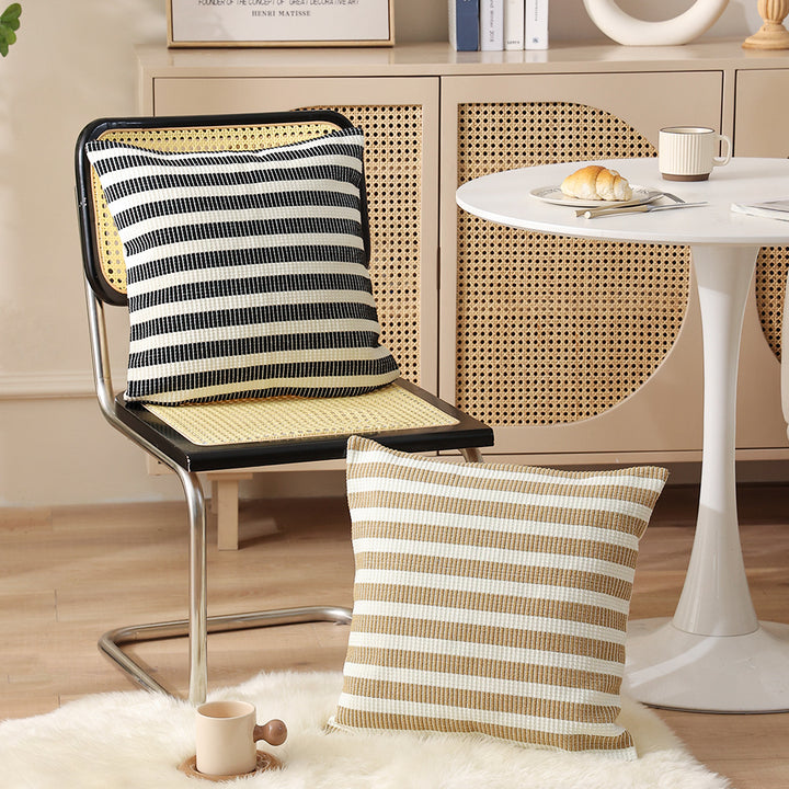Woven square decorative cushion with fine ribbed texture and stripe pattern