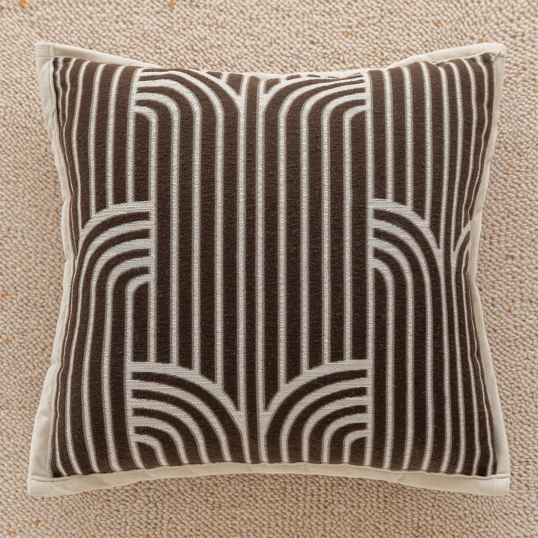 Decorative cushion with geometric pattern