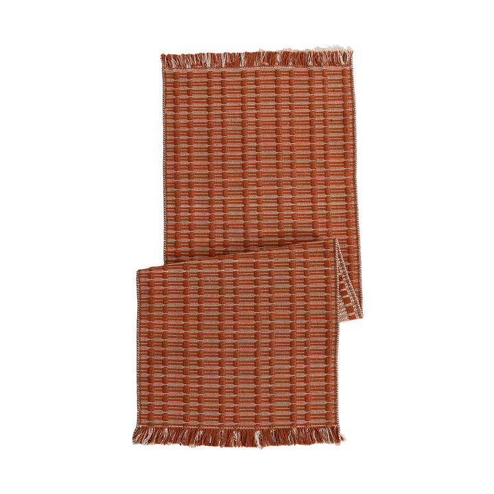 Handwoven plaid made of cotton with structured stripes and fringes