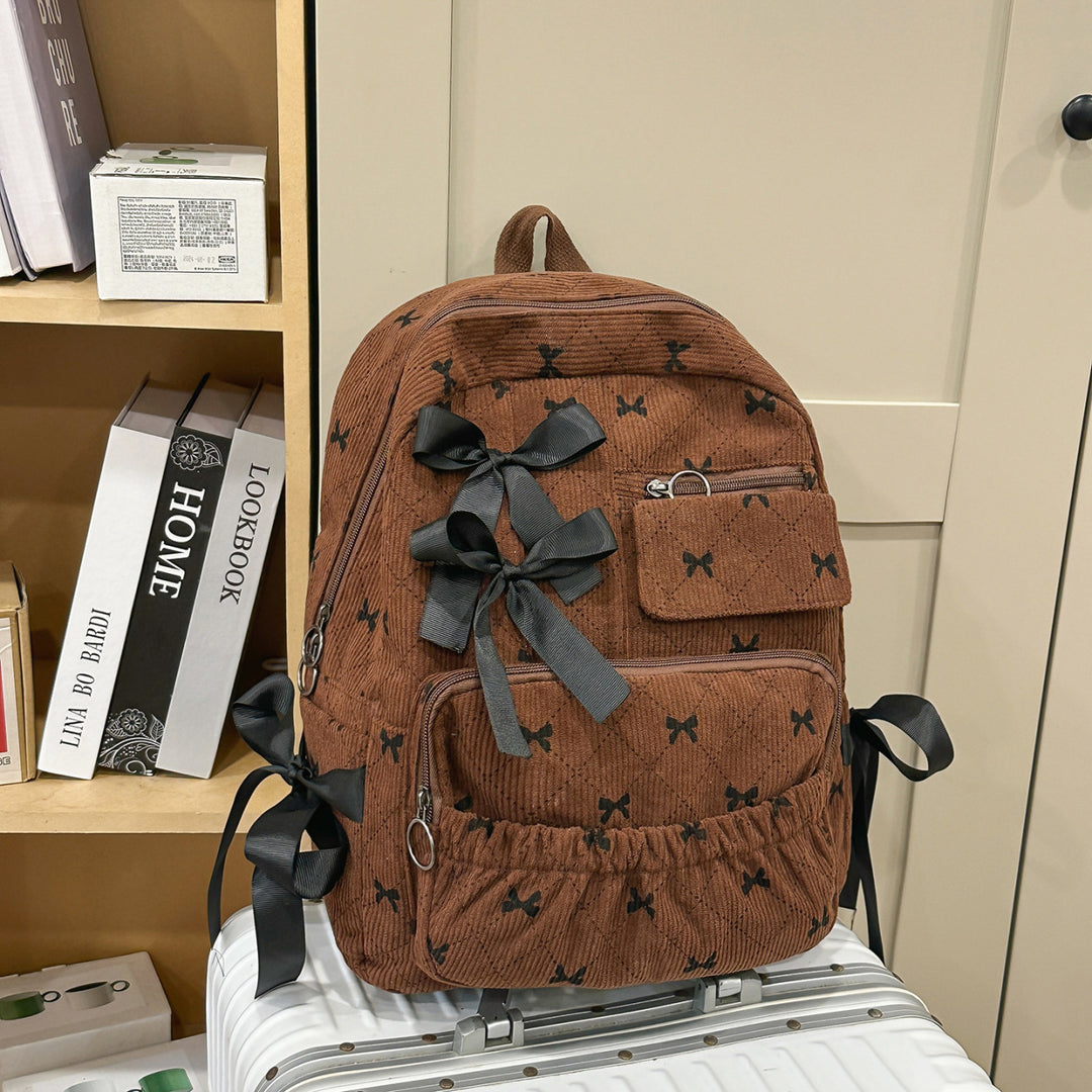 Playful backpack with bow details and practical compartments Stornfield