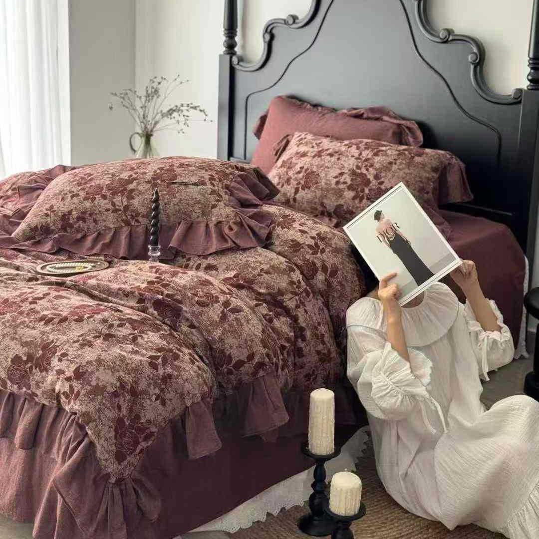 Quilted bed set in vintage look made from cotton blend with velvety floral pattern appearance and ruffle