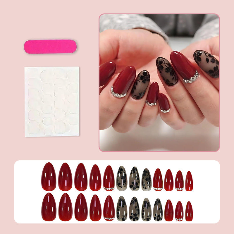 Art nail set with floral and glamorous accents Stornfield