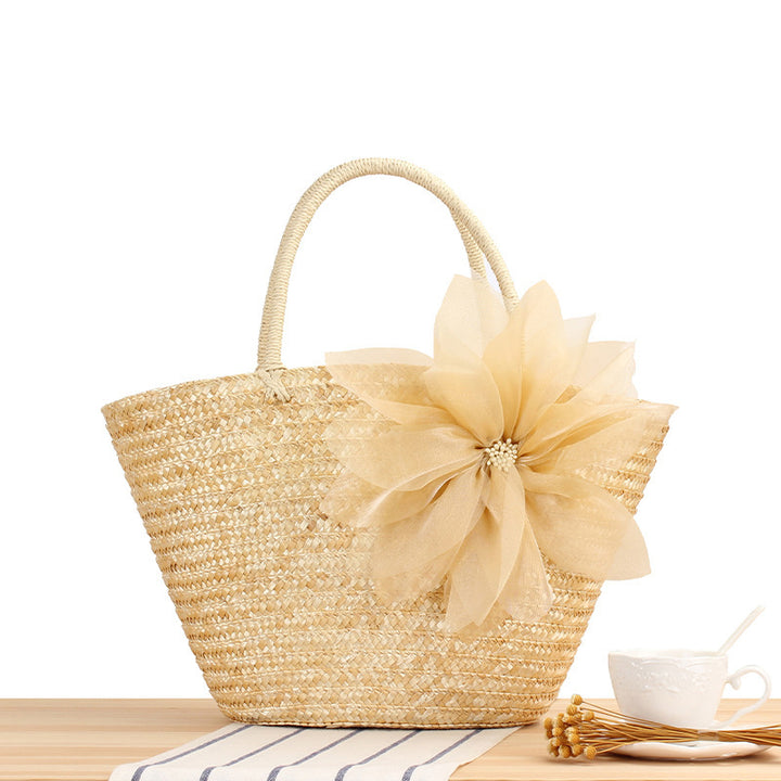 Elegant straw bag with floral accents Stornfield