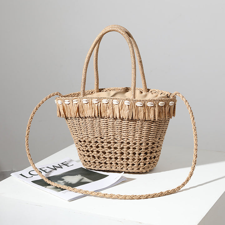 Braided straw bag with decorative tassel detail Stornfield