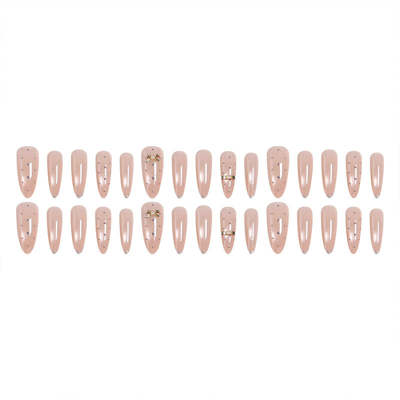 Acrylic nail set with elegant jewelry details Stornfield