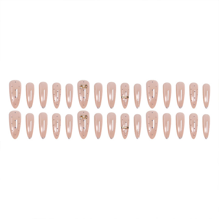 Acrylic nail set with elegant jewelry details Stornfield