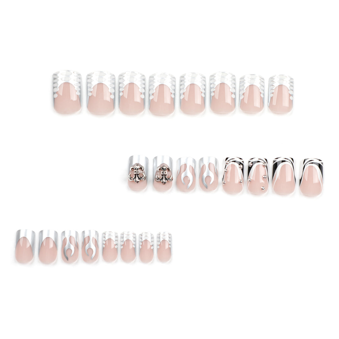 Artistic nail extensions with metallic embellishments Stornfield