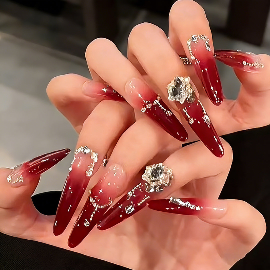 Artificial nails with elegant glitter and jewelry accents Stornfield