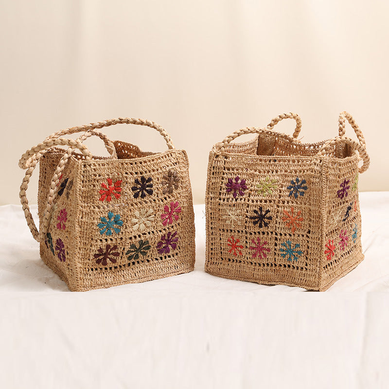 Handcrafted straw bag with colorful embroidery design Stornfield