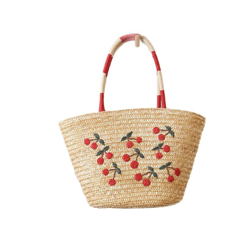 Handcrafted basket bag with vibrant floral embroidery design Stornfield