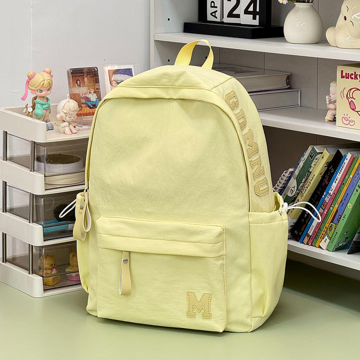Stylish Canvas Backpack with Plush Keychain Stornfield