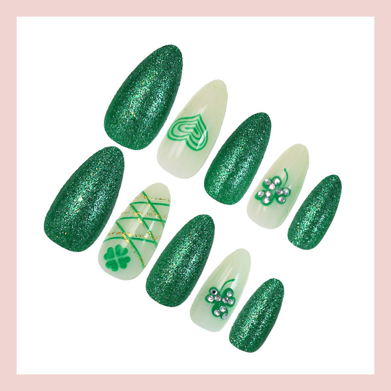 Artificial nail set with glamorous glitter and lucky designs Stornfield