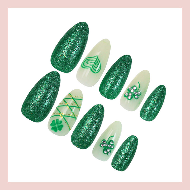 Artificial nail set with glamorous glitter and lucky designs Stornfield