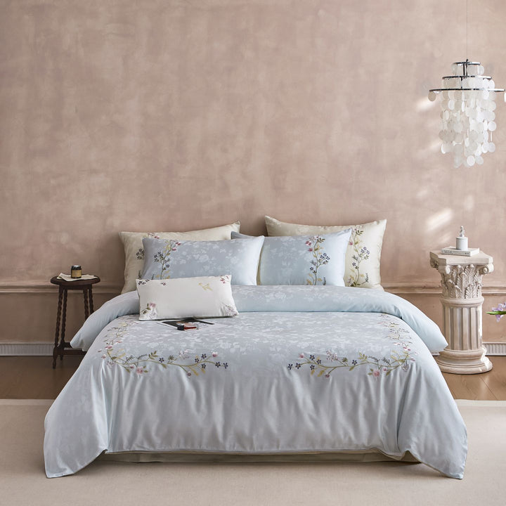 Satin bedding set with fine floral embroidery and jacquard structure
