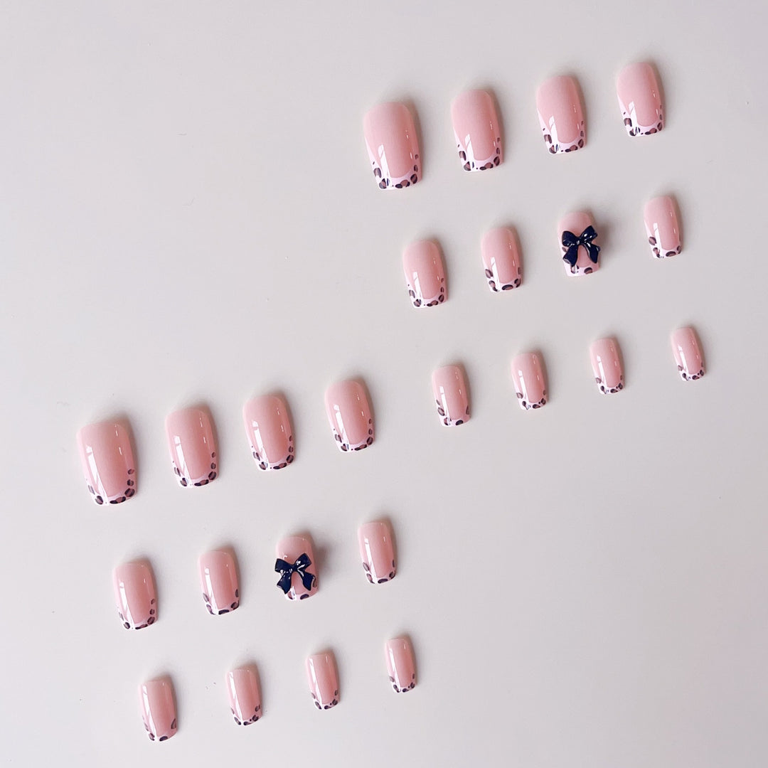 Artificial nail set with elegant 3D bows and leopard design Stornfield
