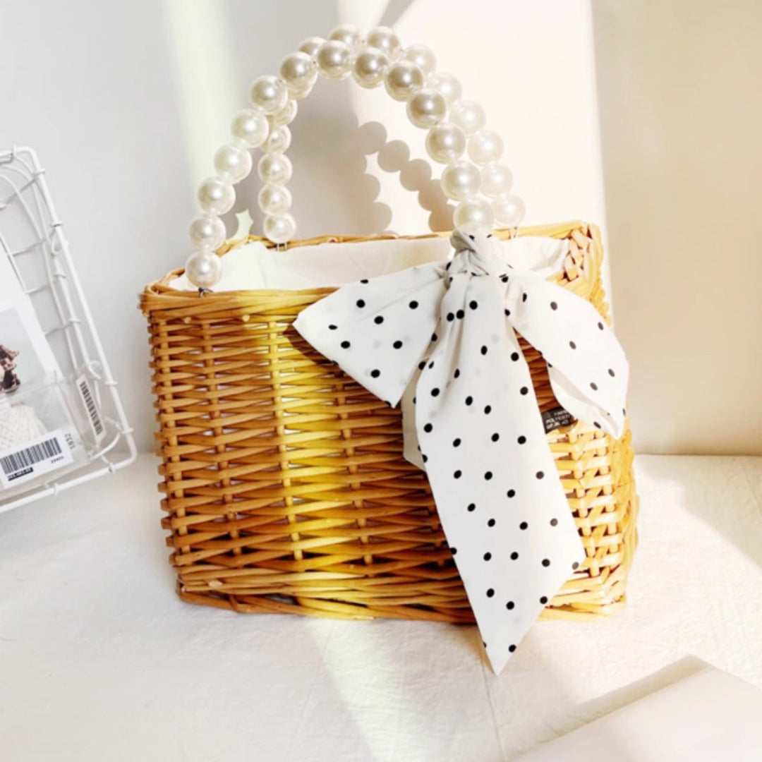 Ladies handbag made of braided material with elegant pearl handles Stornfield