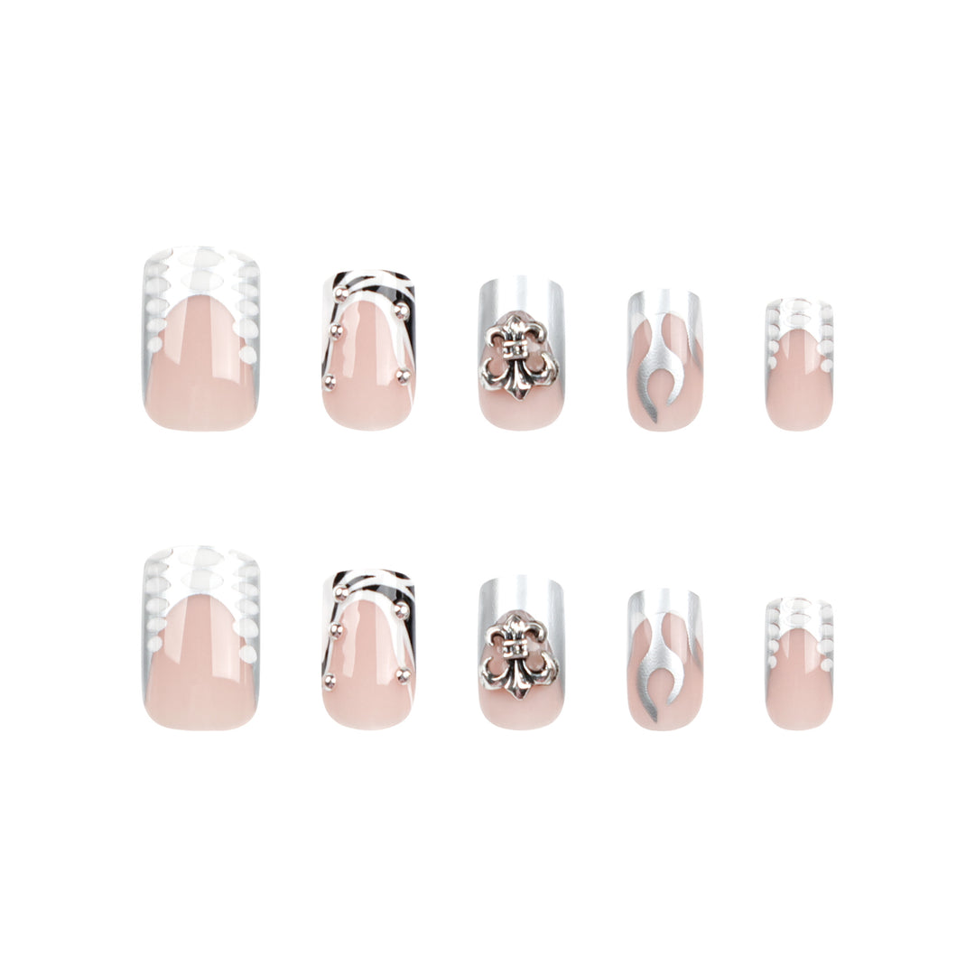 Artistic nail extensions with metallic embellishments Stornfield