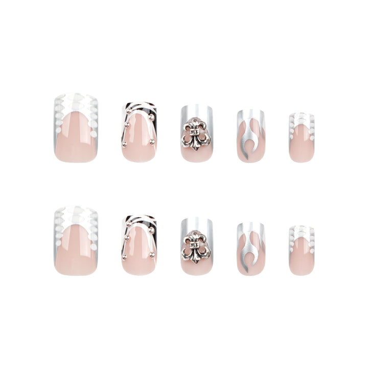Artistic nail extensions with metallic embellishments Stornfield