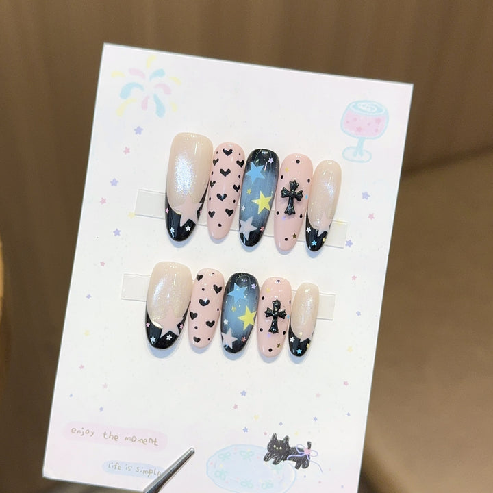 Artificial nail tips with playful star and heart designs Stornfield