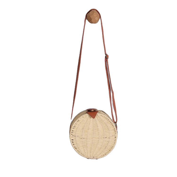 Round basket bag with leather accents Stornfield