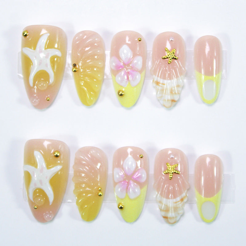 Artificial nail set with maritime shell and flower motifs Stornfield
