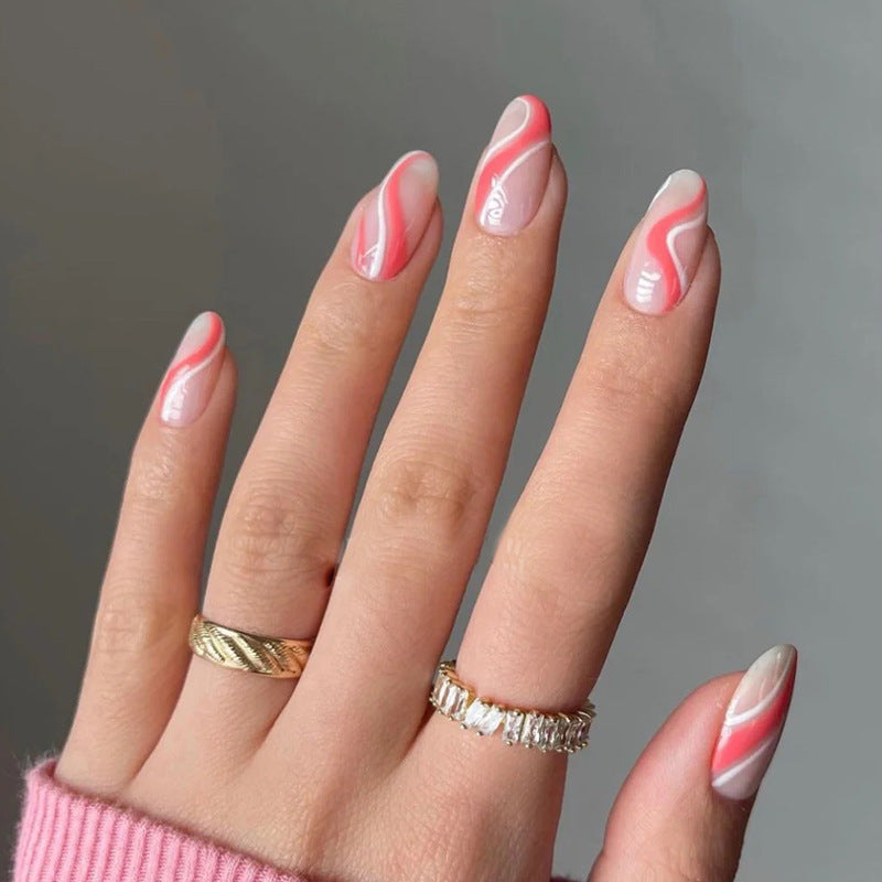 Artful nail extensions with an elegant leaf pattern Stornfield