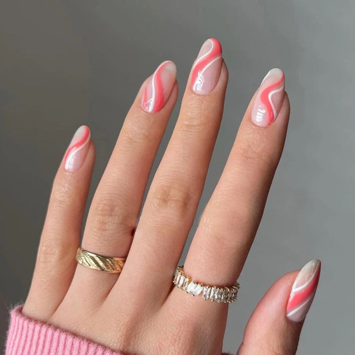 Artful nail extensions with an elegant leaf pattern Stornfield