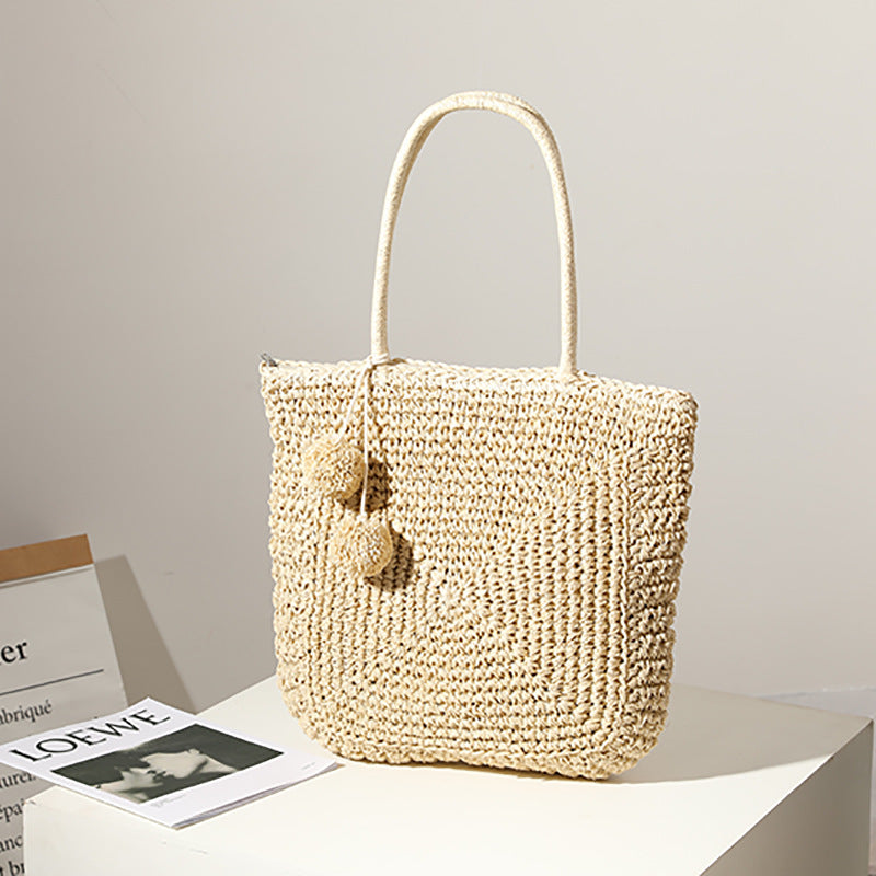 Handmade straw bag with pompom details Stornfield