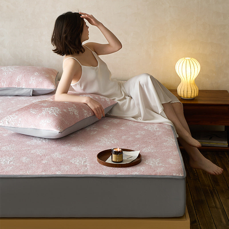 Quilted microfiber mattress pad with non-slip bottom and floral jacquard surface