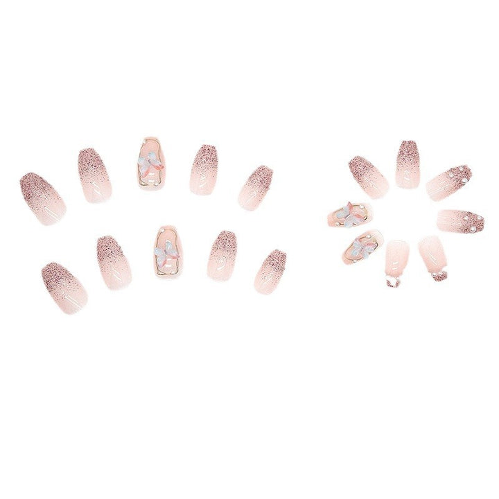 Artificial nails with elegant ombre design and delicate accents Stornfield