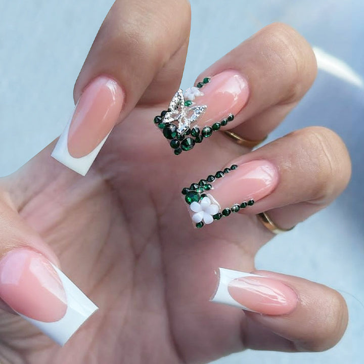 Acrylic nail set with elegant rhinestone decorations and floral design Stornfield