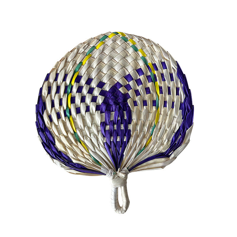 Women hand-woven fan made of natural material Stornfield