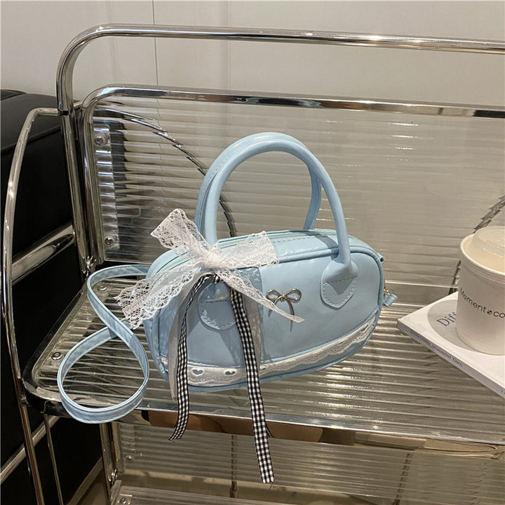 Elegant Lace-Trimmed Bow Handbag Stornfield