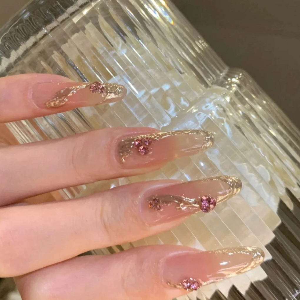 Decorative Acrylic Nail Extensions with Floral Accents