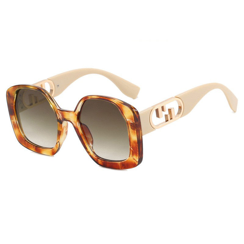 Women oversized sunglasses with extravagant geometric frame and elegant accents Stornfield