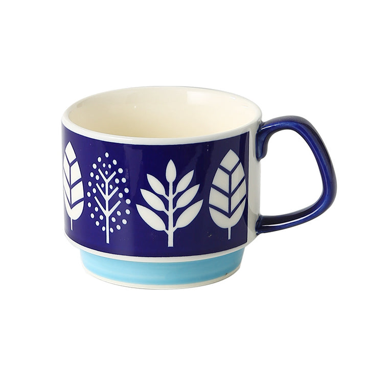 Ceramic mug with retro polka dot design and ergonomic handle