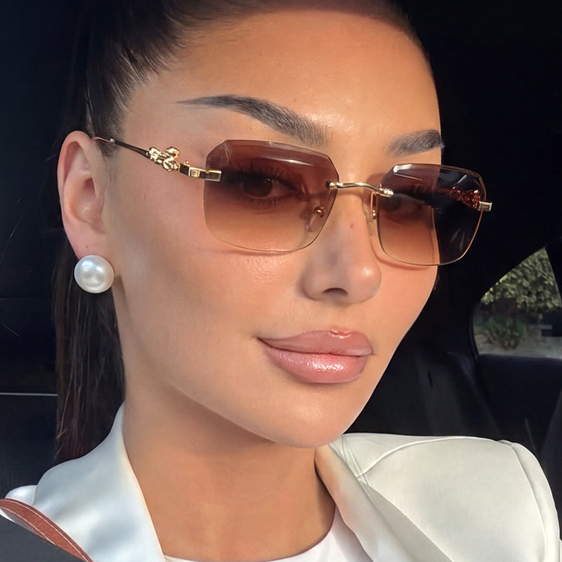 Women's fashionable square sunglasses with elegant gold frame and protective UV filter Stornfield