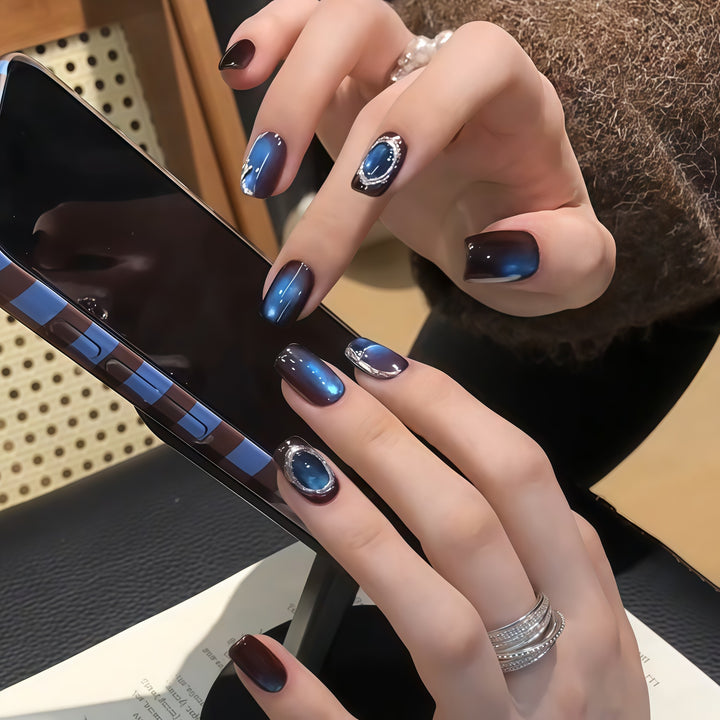 Artificial nails in elegant ombre style with crystal embellishments Stornfield