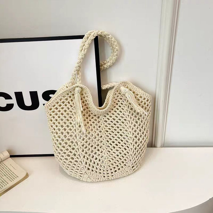 Handcrafted straw bag with tassels Stornfield