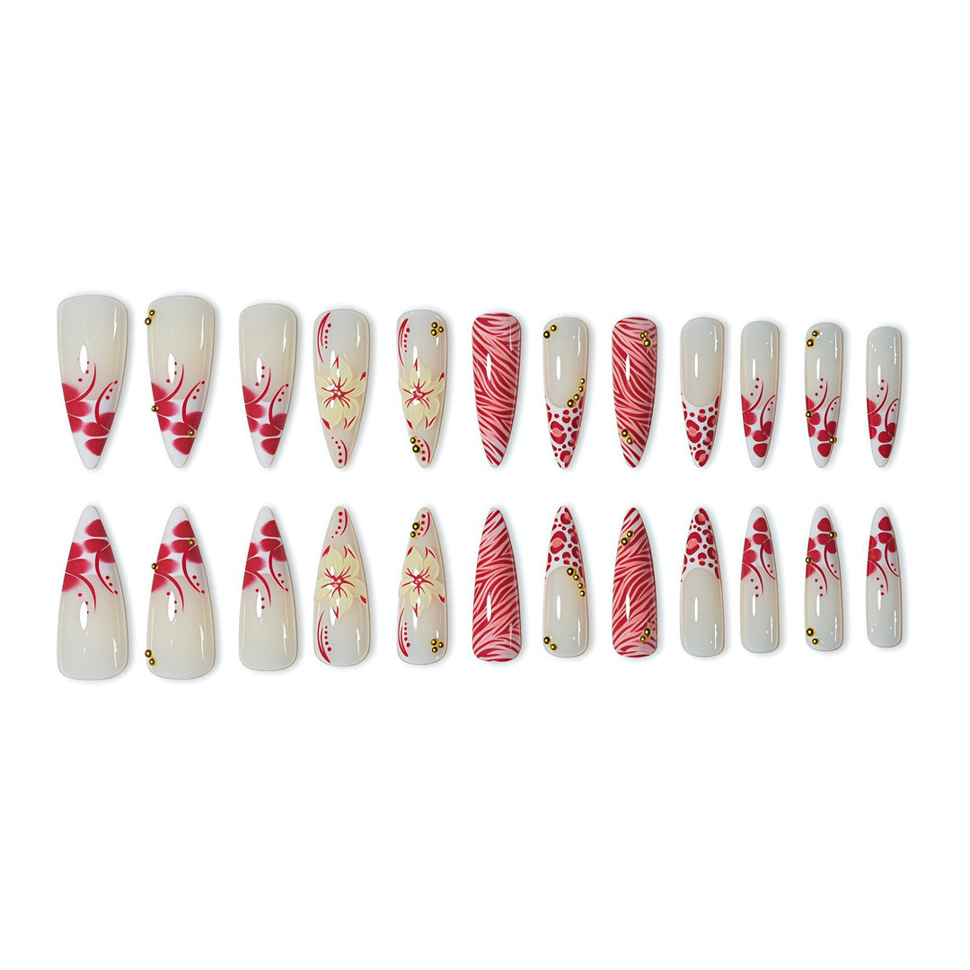 Elegant Stiletto Nail Enhancements with Floral and Animal Print Designs Stornfield