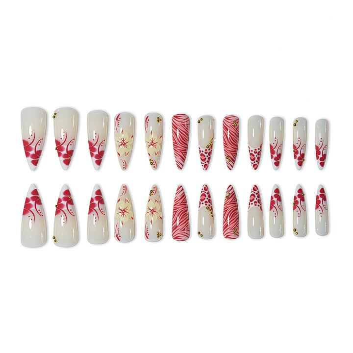 Elegant Stiletto Nail Enhancements with Floral and Animal Print Designs Stornfield