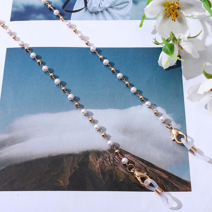 Jewelry necklace with elegant pearls and golden accents Stornfield