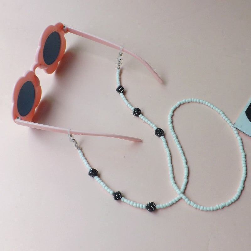 Sunglasses with fashionable pearl band Stornfield