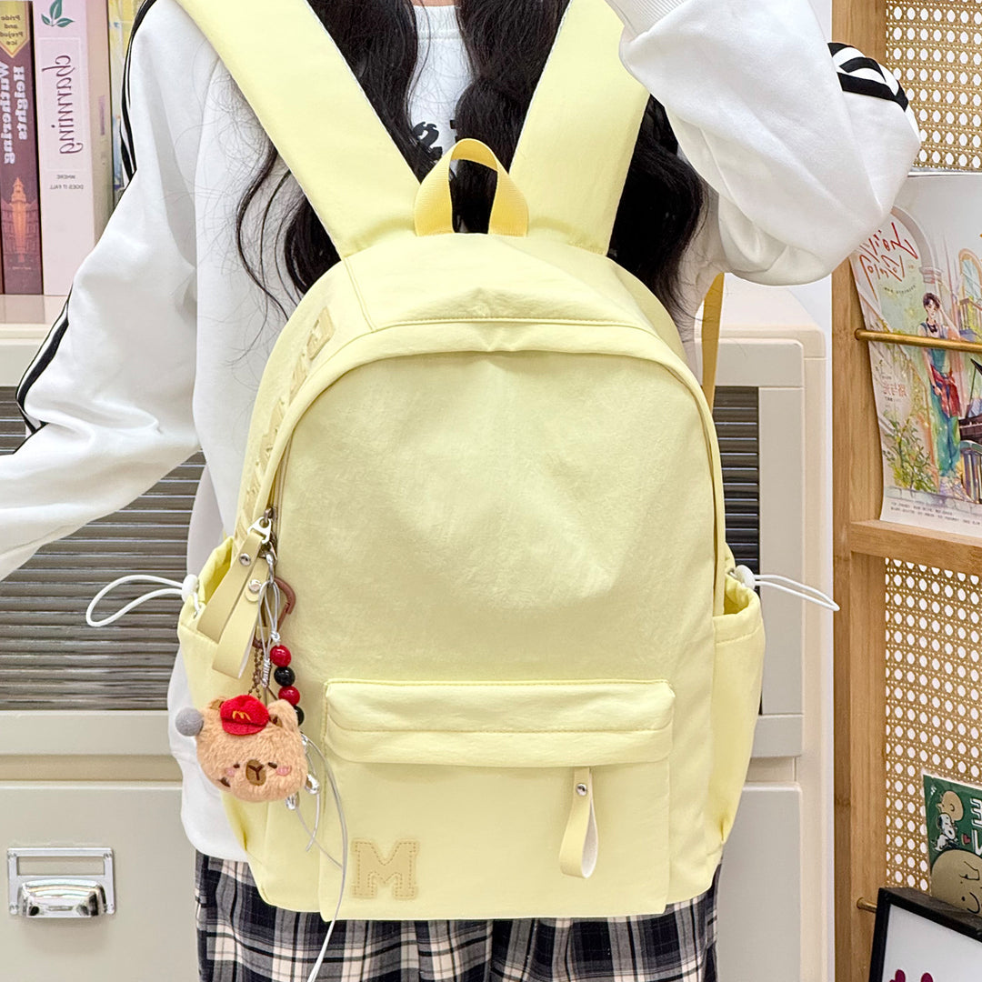 Stylish Canvas Backpack with Plush Keychain Stornfield